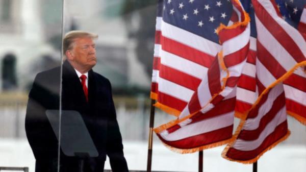 US President Do<em></em>nald Trump looks on at the end of his speech during a rally to co<em></em>ntest the certification of the 2020 US presidential election results by the US Congress, in Washington, US, January 6, 2021.