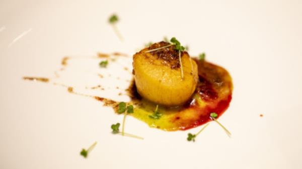 Achari scallop with linseed sour-a Sylheti traditio<em></em>nal sauce with green mango puree and Chittagong’s wild blood fruit sauce. Photo: Courtesy