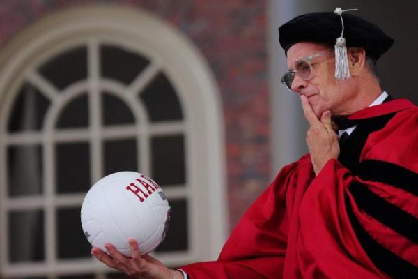 Tom Hanks given a Harvard-branded volleyball. Photo: collected 
