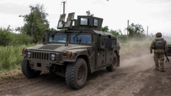 FILE PHOTO: A HMMWV (Humvee) vehicle moves along a road near a the recently retaken village of Novodarivka, amid Russia&#039;s attack on Ukraine, in Zaporizhzhia region, Ukraine July 2, 2023. Radio Free Europe/Radio Liberty/Serhii Nuzhnenko via REUTERS

