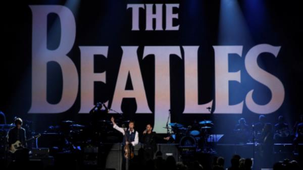 Paul McCartney (L) and Ringo Starr perform during the taping of &quot;The Night That Changed America: A GRAMMY Salute To The Beatles&quot;, which commemorates the 50th anniversary of The Beatles appearance on the Ed Sullivan Show, in Los Angeles January 27, 2014. REUTERS/Mario Anzuoni/File Photo