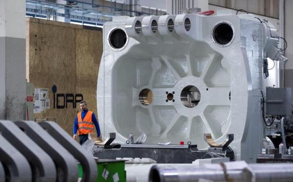 A part of a press machine is pictured at the IDRA group plant in Travagliato