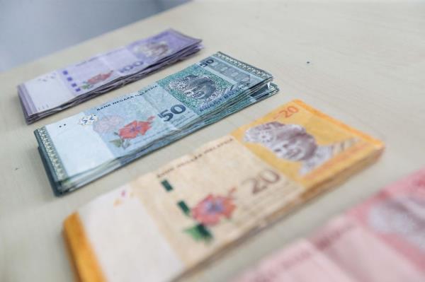 Ringgit opens lower against US dollar