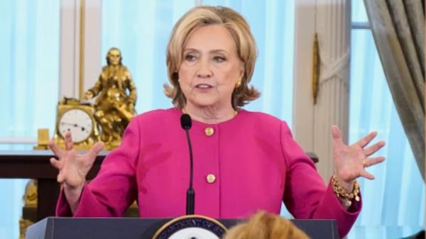 Former U.S. Secretary of State Hillary Rodham Clinton delivers remarks during the unveiling of her portrait, at the State Department in Washington, U.S., September 26, 2023. REUTERS/Ken Cedeno/File Photo