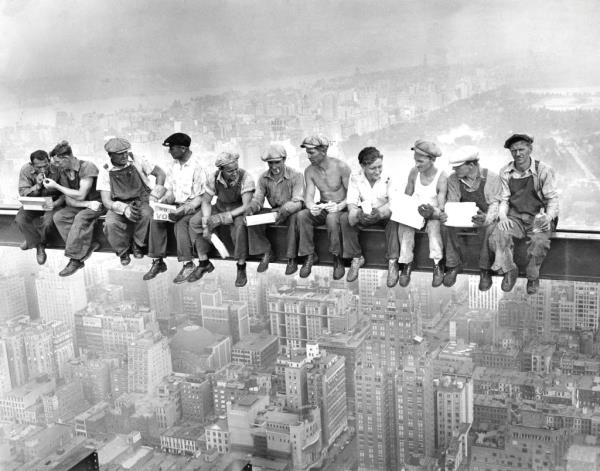 A new attraction called "The Beam" opened at Rockefeller Center. It lifts patrons 12 feet in the air over the skyscraper.