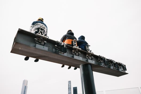 Despite the rain, many lined up to ride "The Beam" on Friday afternoon.