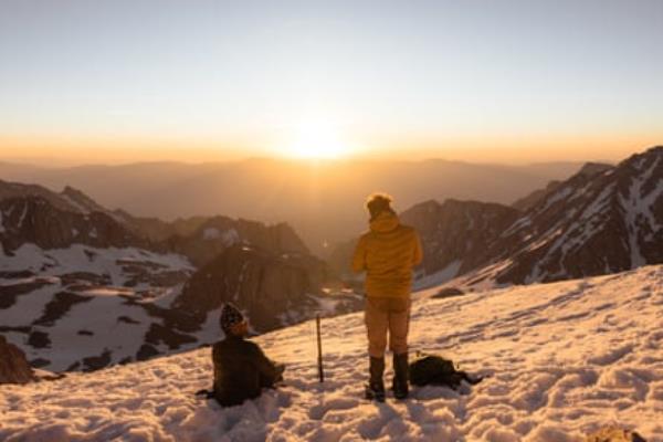 two people on a mountain top