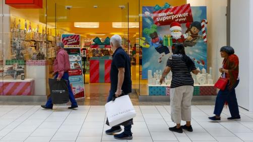 shoppers outside lego store